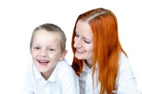 laughing mother and son