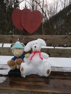 Fluffy toys on a bench