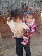 happy kids in a village, china, yunan