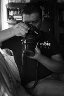 Big camera in a man's hands
