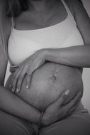 Black and white photo of the pregnant woman