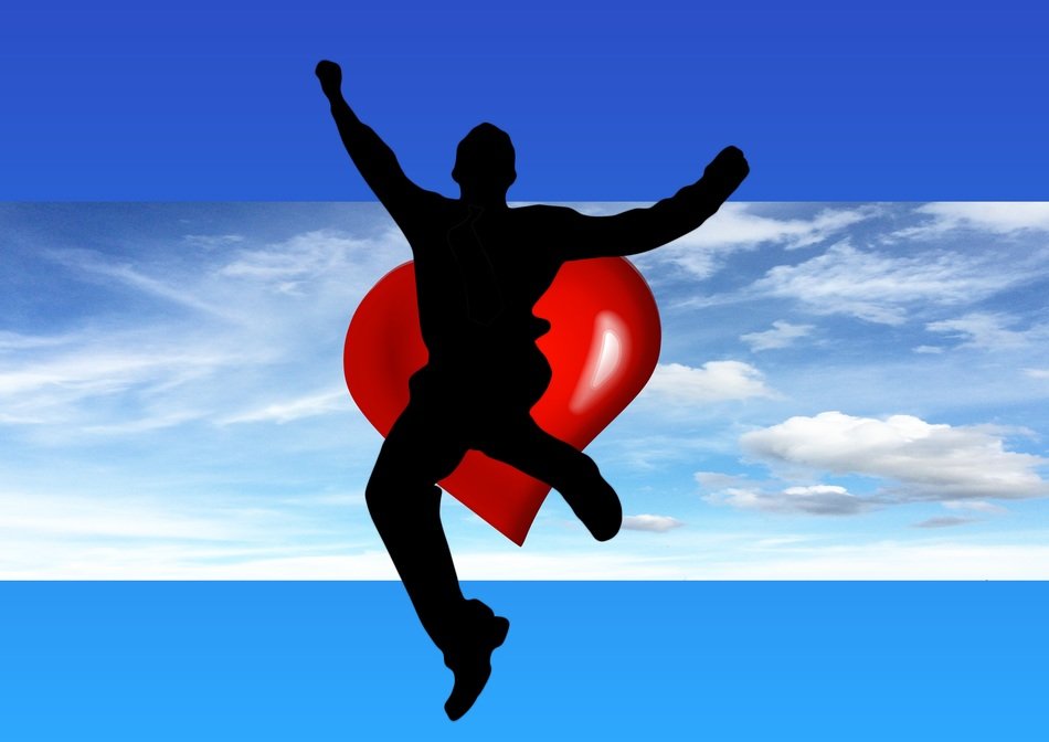 silhouette of man in the background of the heart