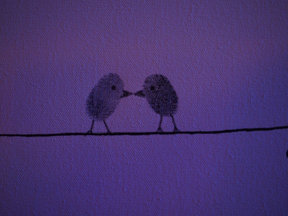 Violet birds made by making the thumbprints