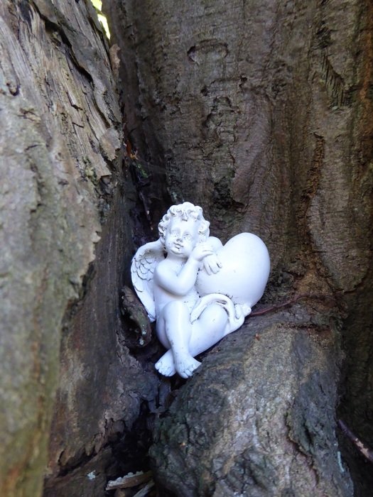 white angel on a tree close-up