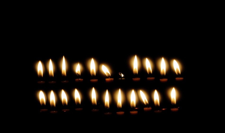 flame of candles in the darkness