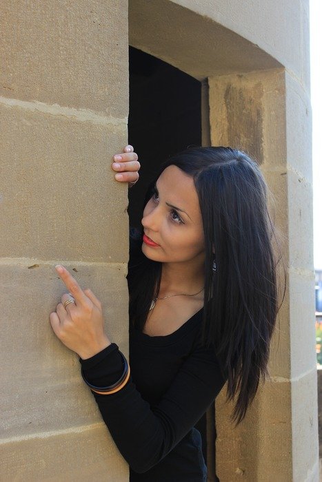 model posing by the door