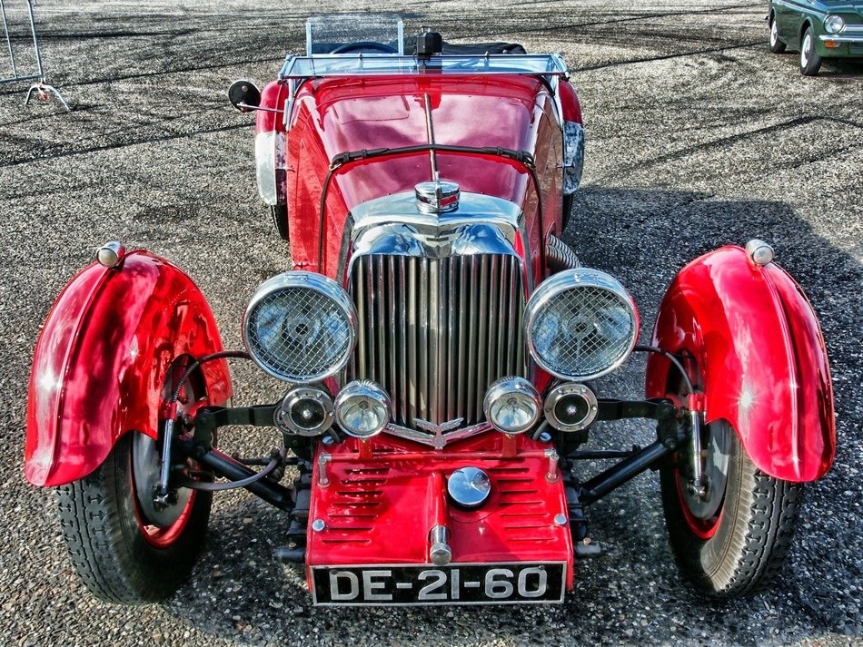 red retro car on the field