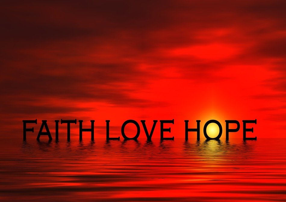 inscription faith love hope against the evening sky