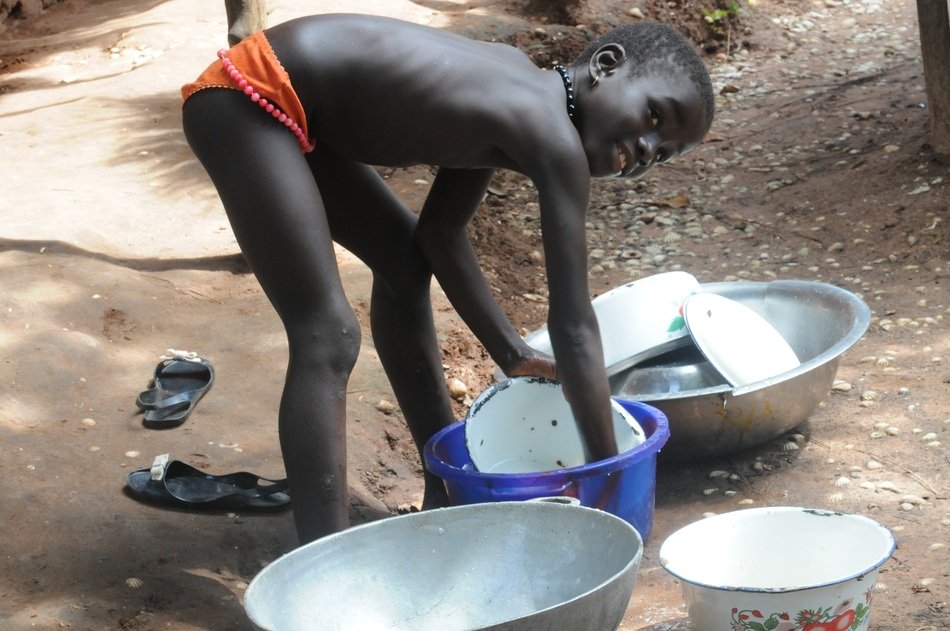 washing up girl in africa