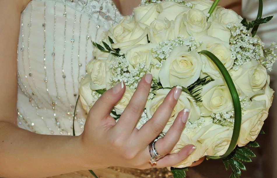 bouquet of white roses in the shape of a ball