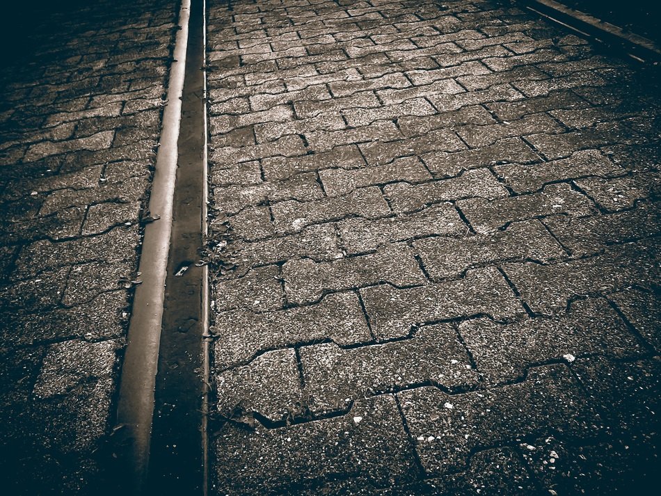 rails on the street with tiles