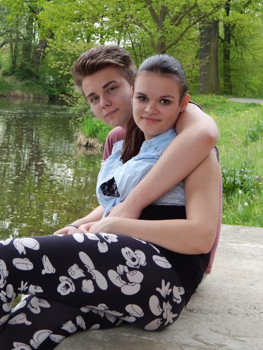 girl and boy in love at riverside