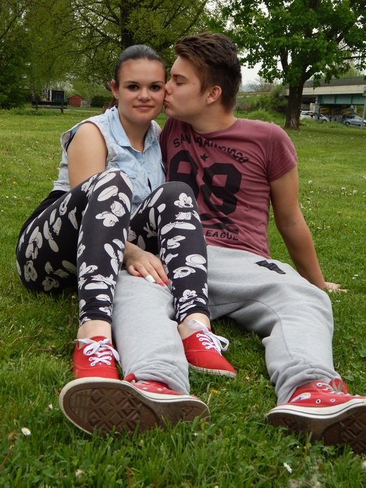 couple in love on green grass in spring