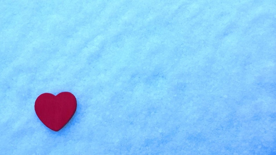 red heart on light blue background