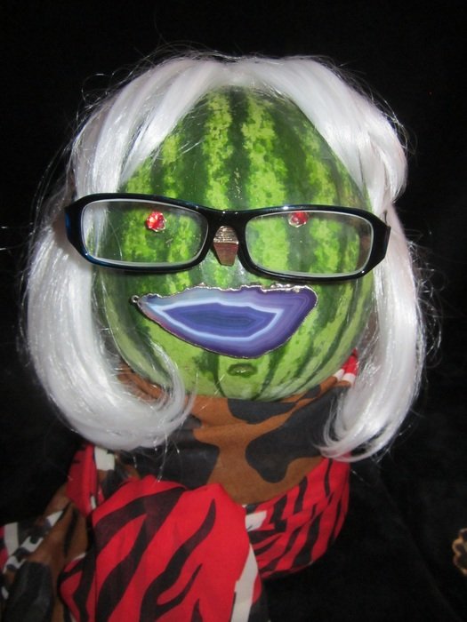 character with a face like a watermelon