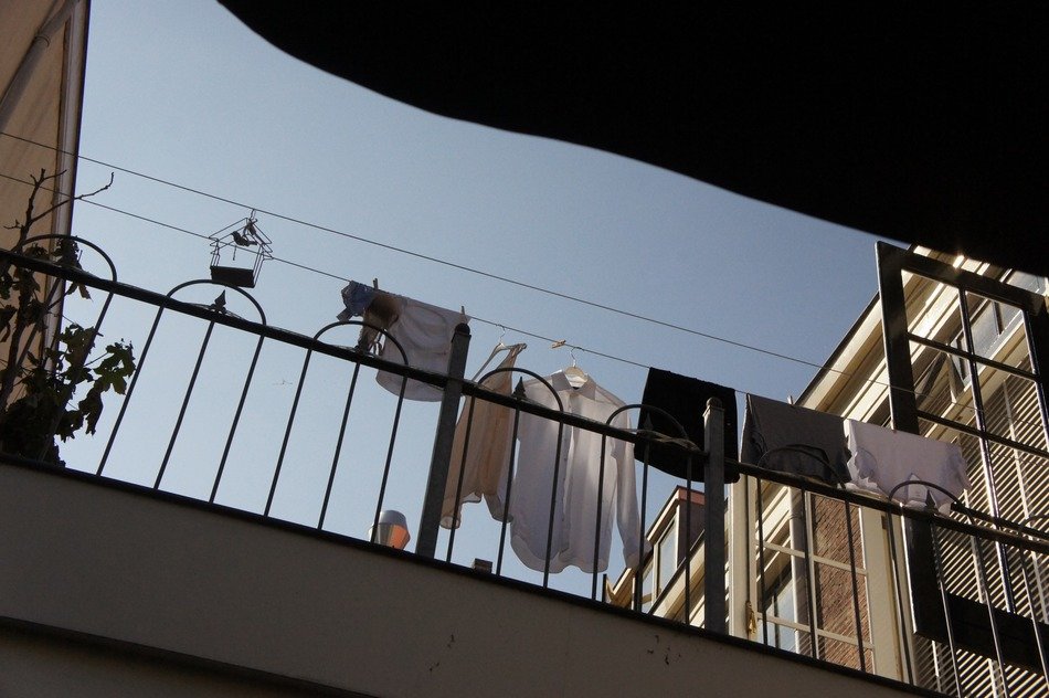 washed laundry dries on the balcony in the netherlands