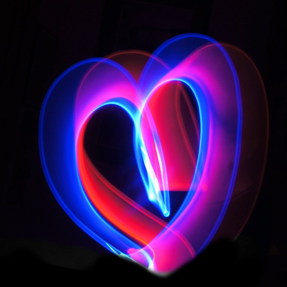 neon heart on black background