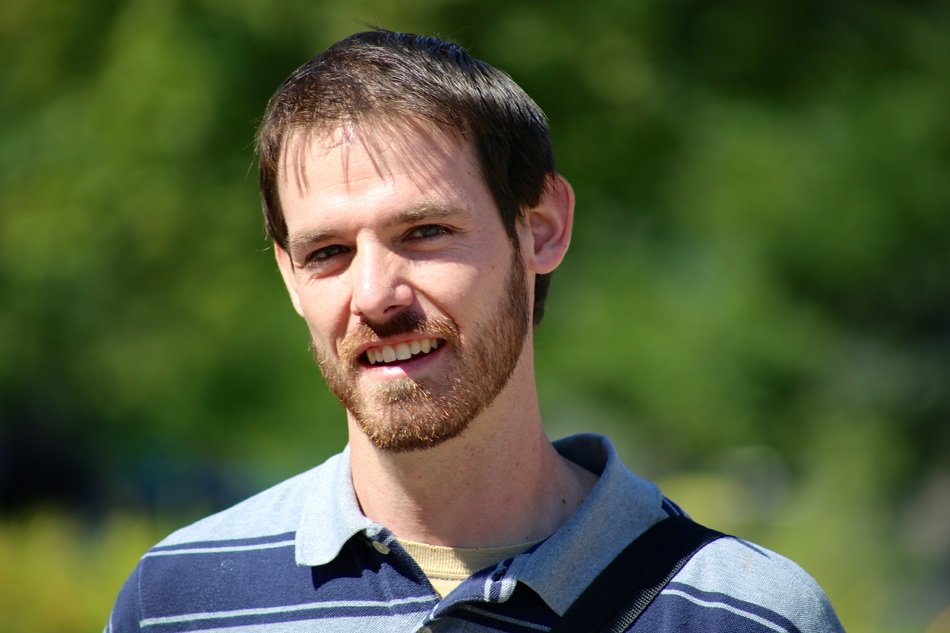 Smiling beard man portrait free image