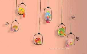 drawings of birds in cages on a pink background