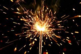 sparklers on black sky background