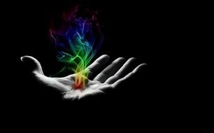 Rainbow Smoke on hand in darkness