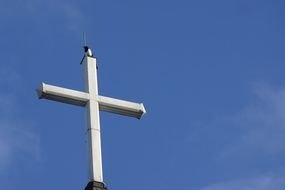 white cross on a background of blue sky