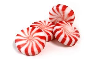 red and white Peppermint Candies in pile