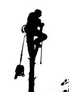 silhouette of a climbing man