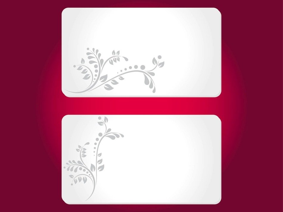 two white cards on burgundy background
