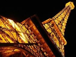 night photo of the Eiffel Tower on the wallpaper