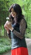 girl in corset with white flower
