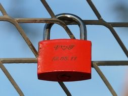 Red love lock with specified date