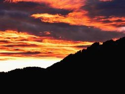 fiery clouds over the mountains