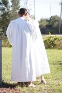 man in white dresses baptism faith religion