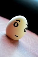 egg with sad emotion face painting