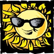 smiling in sunglasses in yellow rays