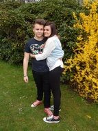 Boyfriend and girlfriend in the park in spring