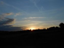 heaven sunset over black silhouettes