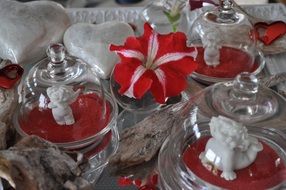 angels of love figurines under a glass dome