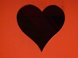 black heart on a brown background