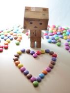Japanese robot and candy in the shape of a heart