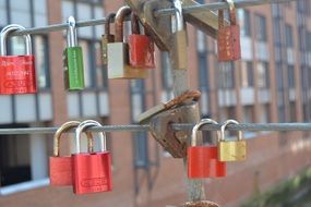 locks on the railing of the bridge