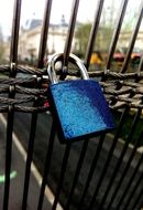 shiny blue lock on a chain