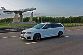 moving car and flying plane