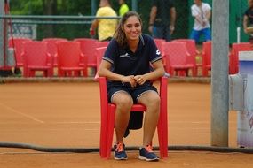 smiling tennis referee