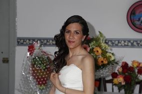 young smiling woman in wedding dress