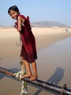 smiling girl on indian beach