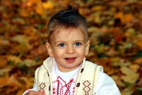 a smile of child with blue eyes