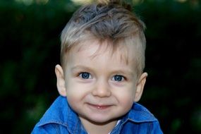 smiling baby with blue eyes