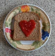 red heart on gray bread